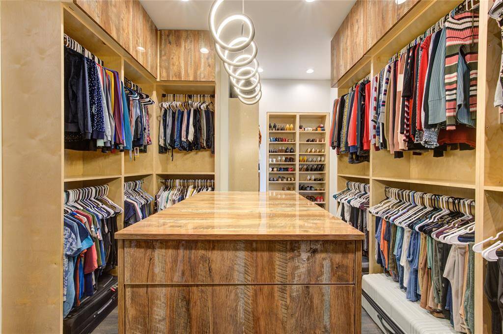 UPGARDED CLOSET WITH CUSTOM BUILT-INS