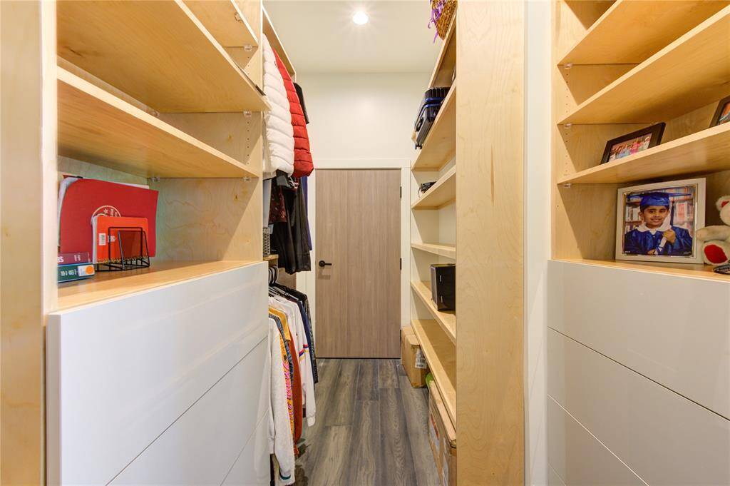 UPGARDED CLOSET WITH CUSTOM BUILT-INS