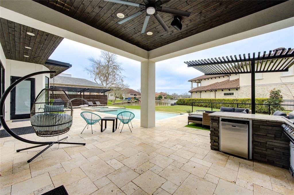 UPGRADED BACKYARD WITH POOL, SPA, PERGOLAS, BBQ GRILL AREA, SITTING AREA WITH FIREPIT