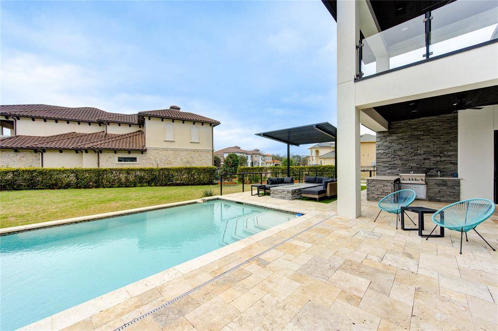 UPGRADED BACKYARD WITH POOL, SPA, PERGOLAS, BBQ GRILL AREA, SITTING AREA WITH FIREPIT