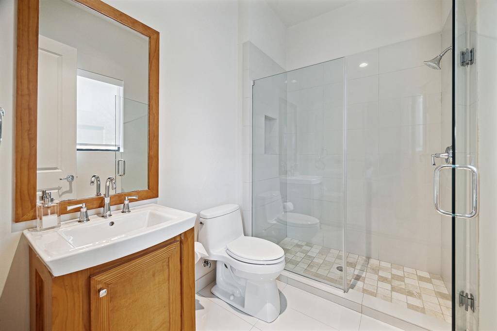 one of three downstairs on-suite full baths