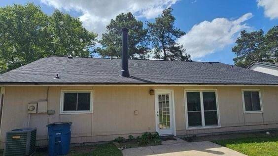 Back View of New Roof installed 3-22-25