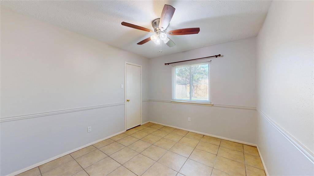 Double-paned windows are throughout the entire house as is the tile flooring.