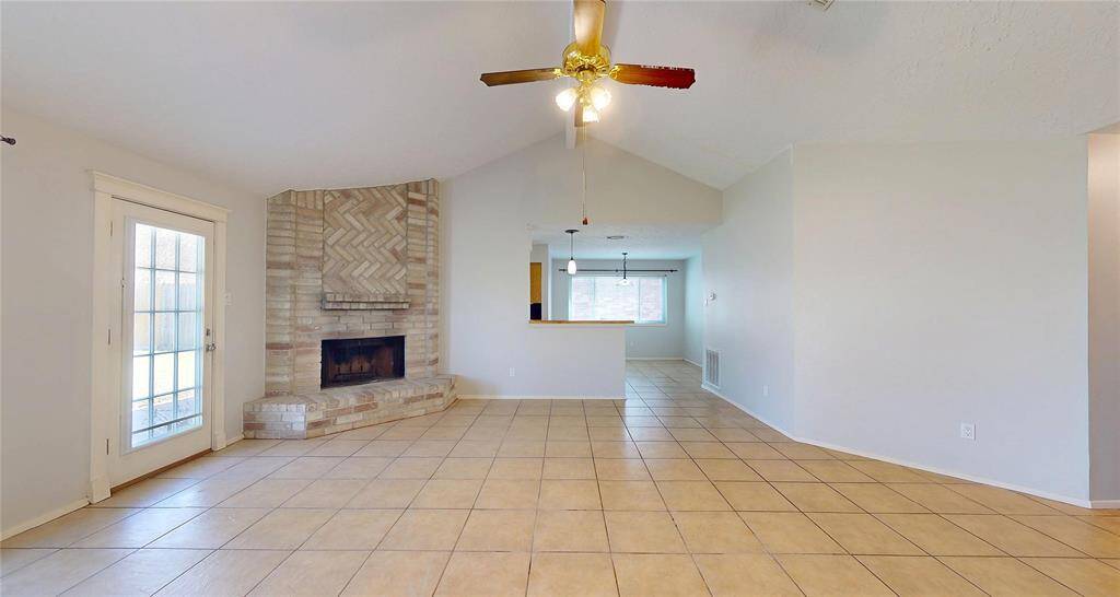 and a floor-to-ceiling fireplace.