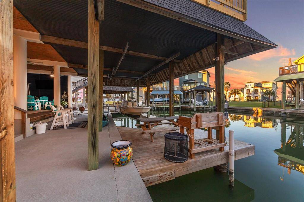 Enhance your waterfront lifestyle with a private boat slip, equipped with a convenient lift and dedicated fish cleaning station.