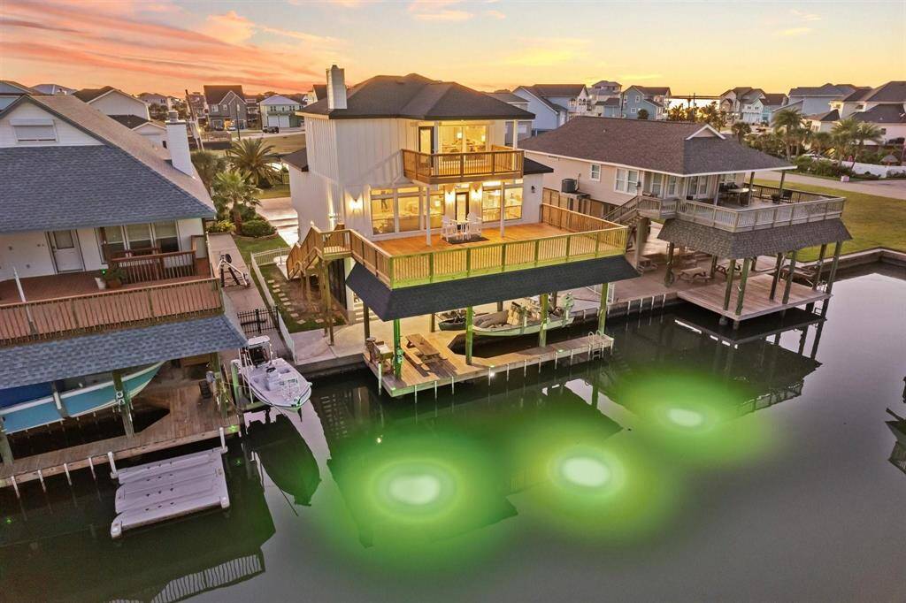 Experience serene waterfront living with this stunning home, boasting integrated underwater lighting perfect for evening fishing.