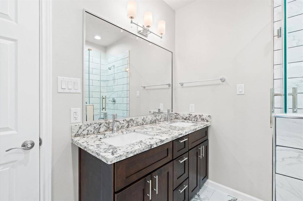 Double sink in primary bathroom.