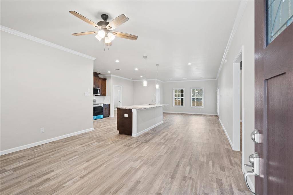 View of the kitchen and living room.