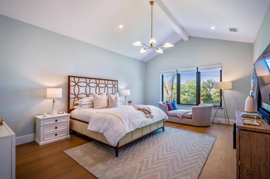 A serene and inviting primary retreat, offering a perfect canvas for your personal touch.