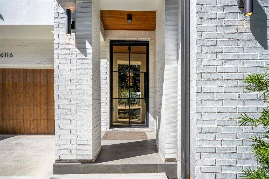 Daylight view of this modern entry.