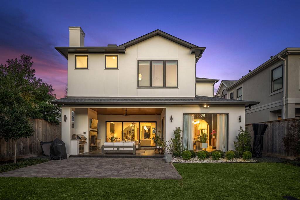 Let's show you the beautiful indoor/outdoor living in this spacious backyard with an extended patio.