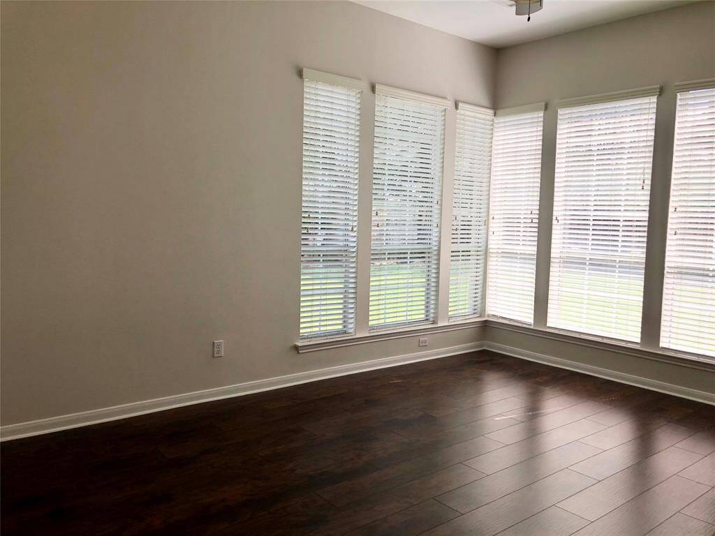 A big wall of windows to enjoy the backyard view!