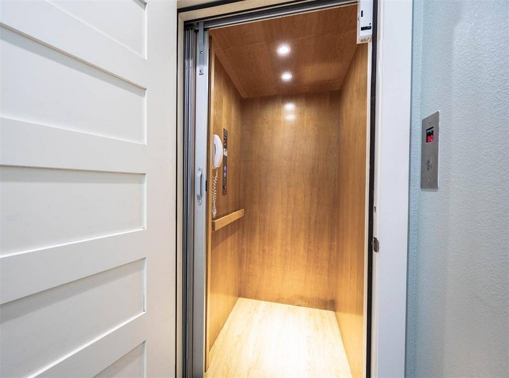 May I offer you a lift? This elevator makes bringing in groceries a cinch!