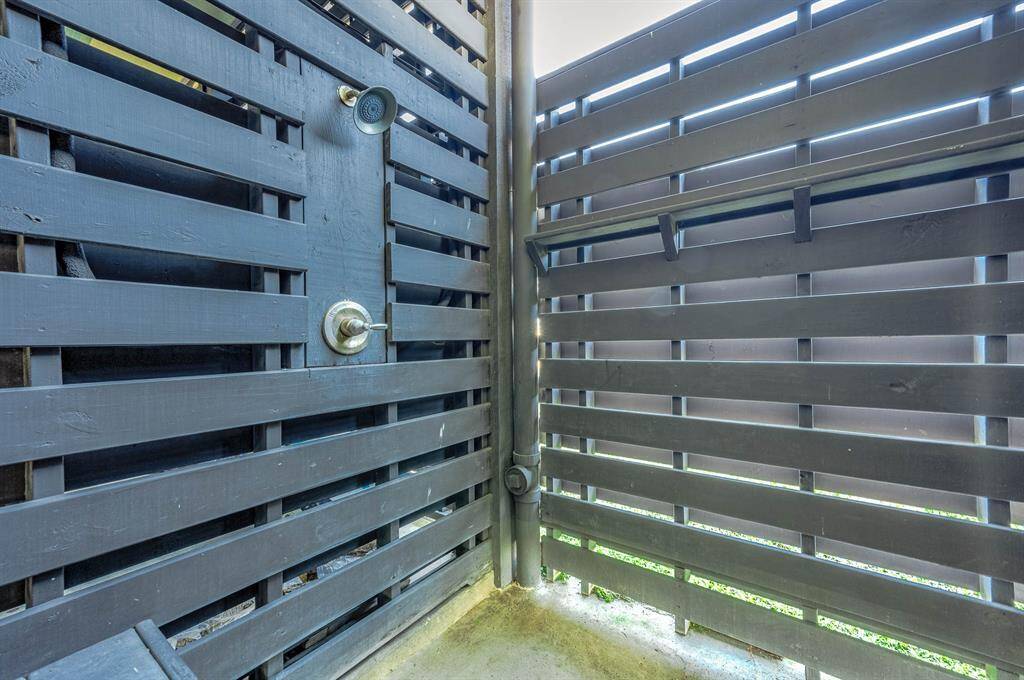 Outdoor shower to keep sand outdoors.