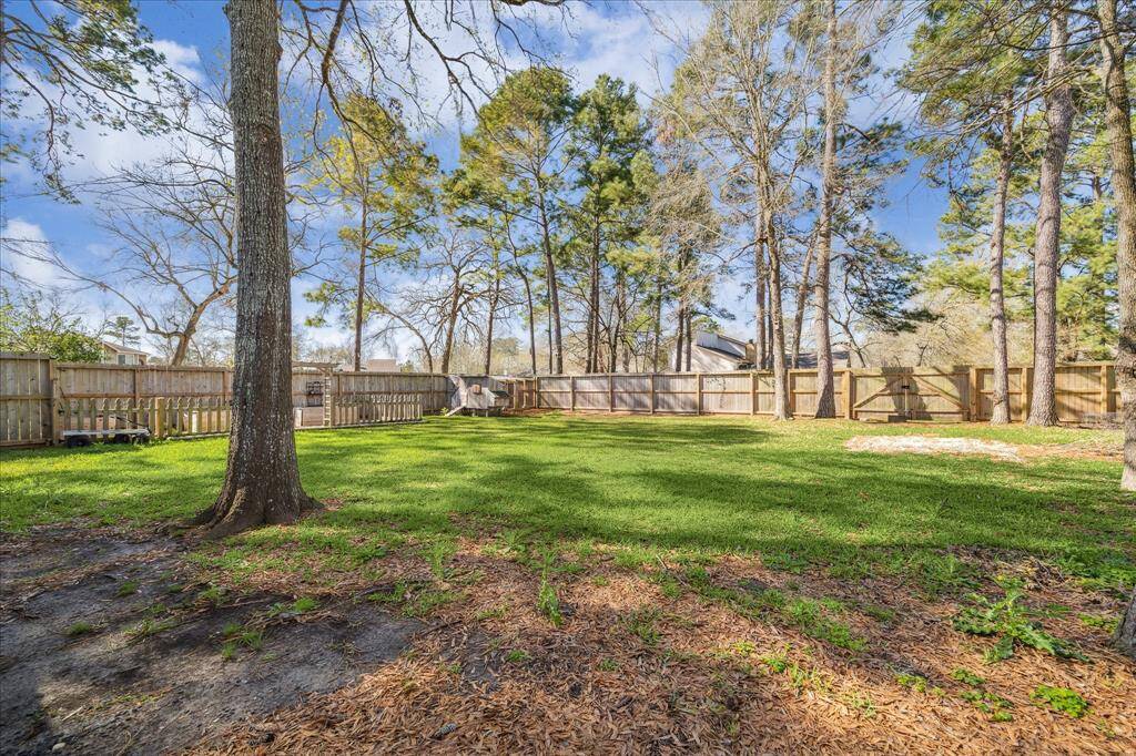 This expansive second lot with mature trees offers a peaceful, private setting for outdoor activities or development. With plenty of space to enjoy nature and create your dream landscape, this lot is a perfect complement to the main property.