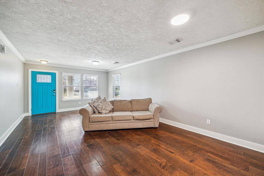 Enjoy an abundance of natural light pouring through expansive windows, offering warmth and brightness to every room. These windows create a serene environment, perfect for relaxation or entertaining.