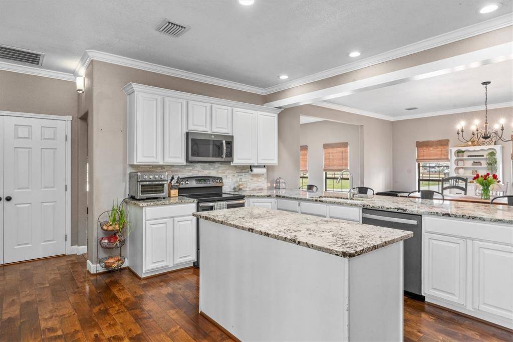 Stainless appliances in kitchen