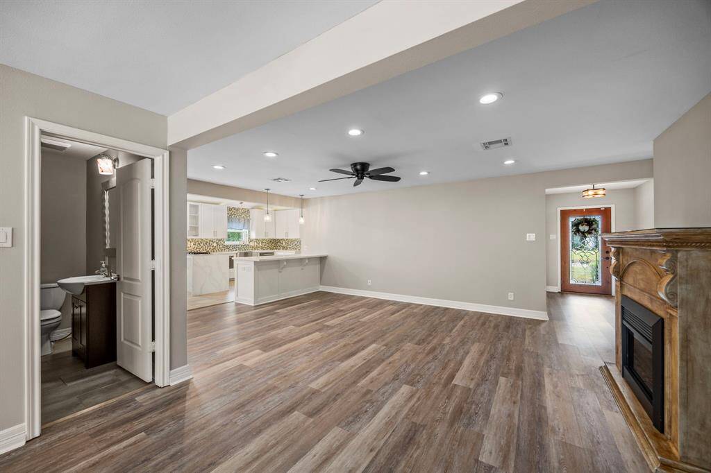 Living room with half bath.