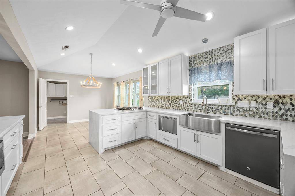 Kitchen has two dishwashers.