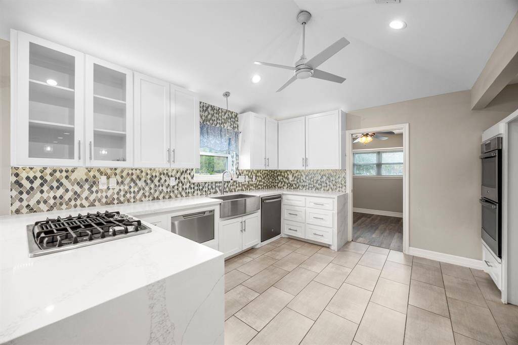 Quartz waterfall countertops.