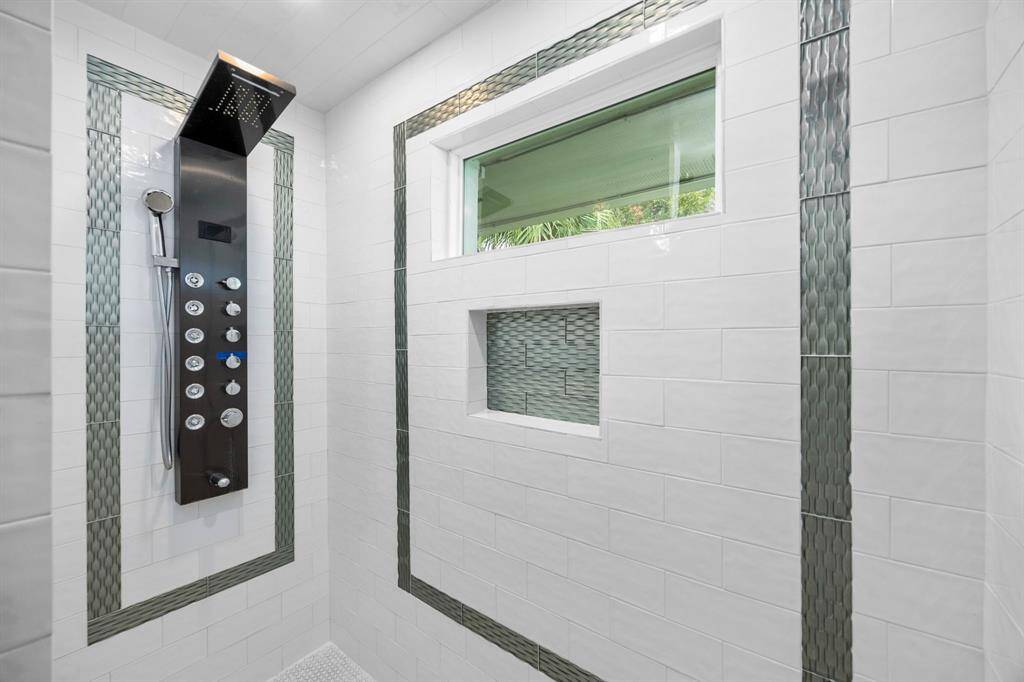 Primary walk-in shower.