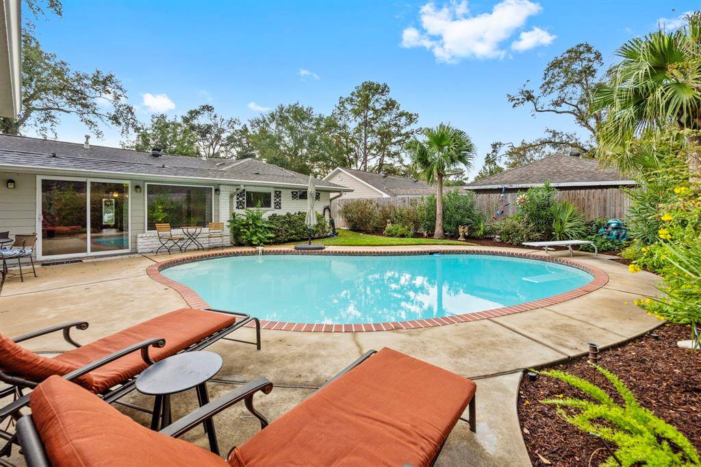 Pool with beautiful landscaping.