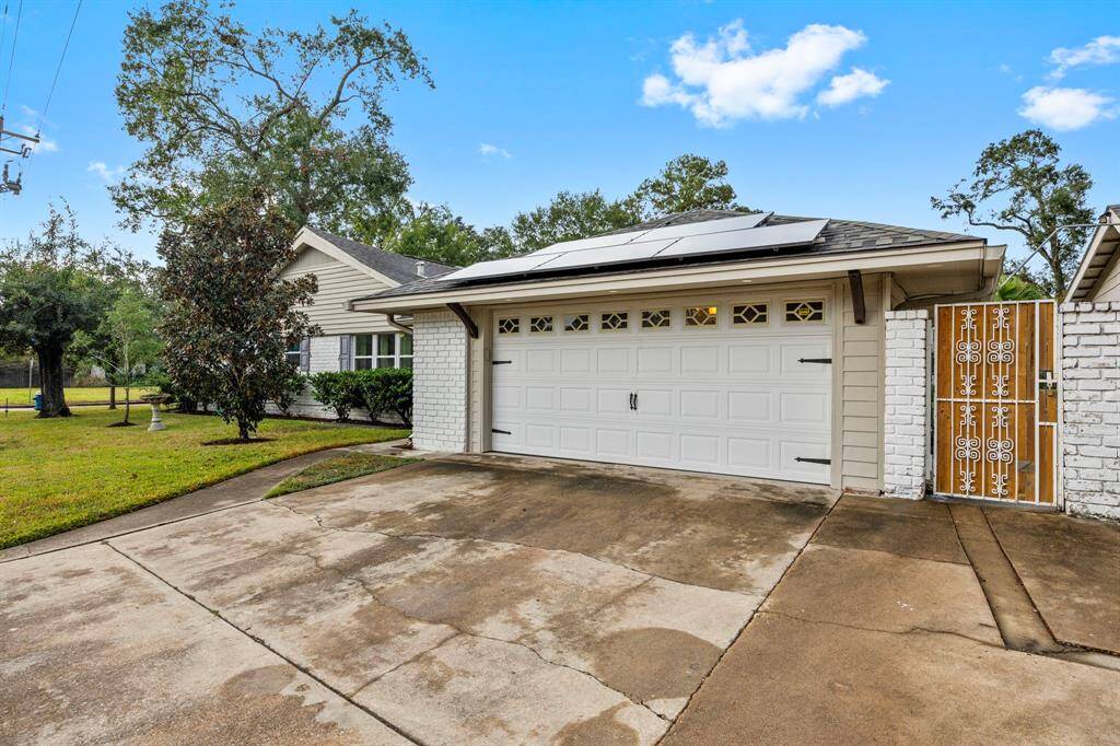 Attached Garage with entry to backyard.