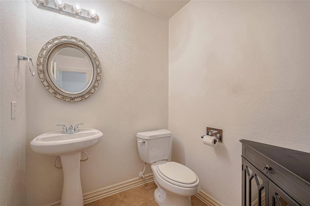 Half bathroom right off to the laundry room