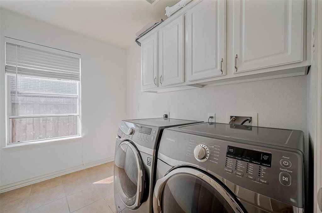 Laundry room is so spacious you can even fit an additional refrigerator to fill for all the entertaining you will want to.