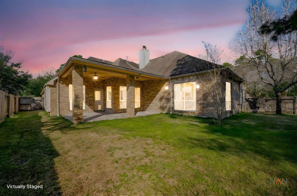 this backyard is so spacious and inviting.