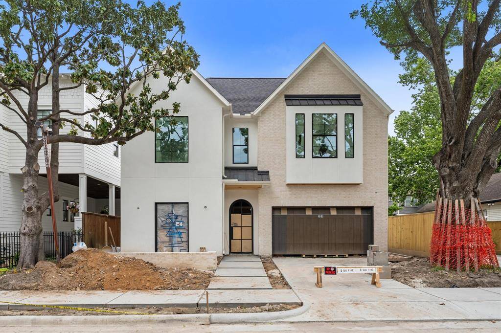 Welcome to 203 E 24th Street! This stunning home is on a beautiful tree-lined curbed & guttered street. The exterior features a stucco finish, brick facade and steel doors. Completion early May!