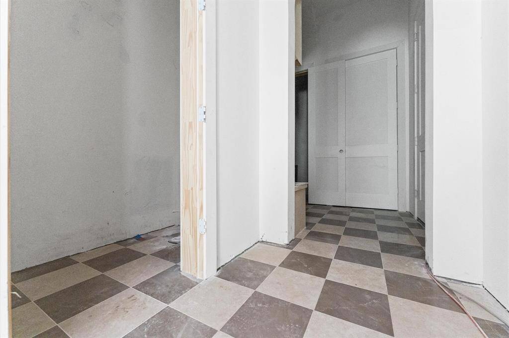 Mudroom and powder bath mosaic tile floors.