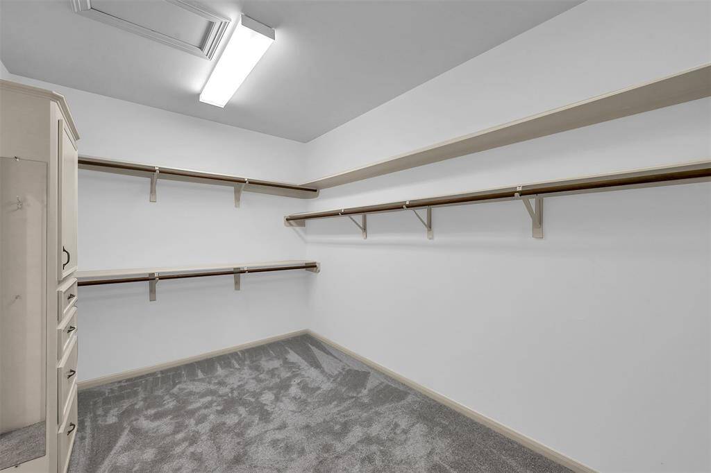 Primary Closet. Each primary bedroom has a very large walk-in closet.