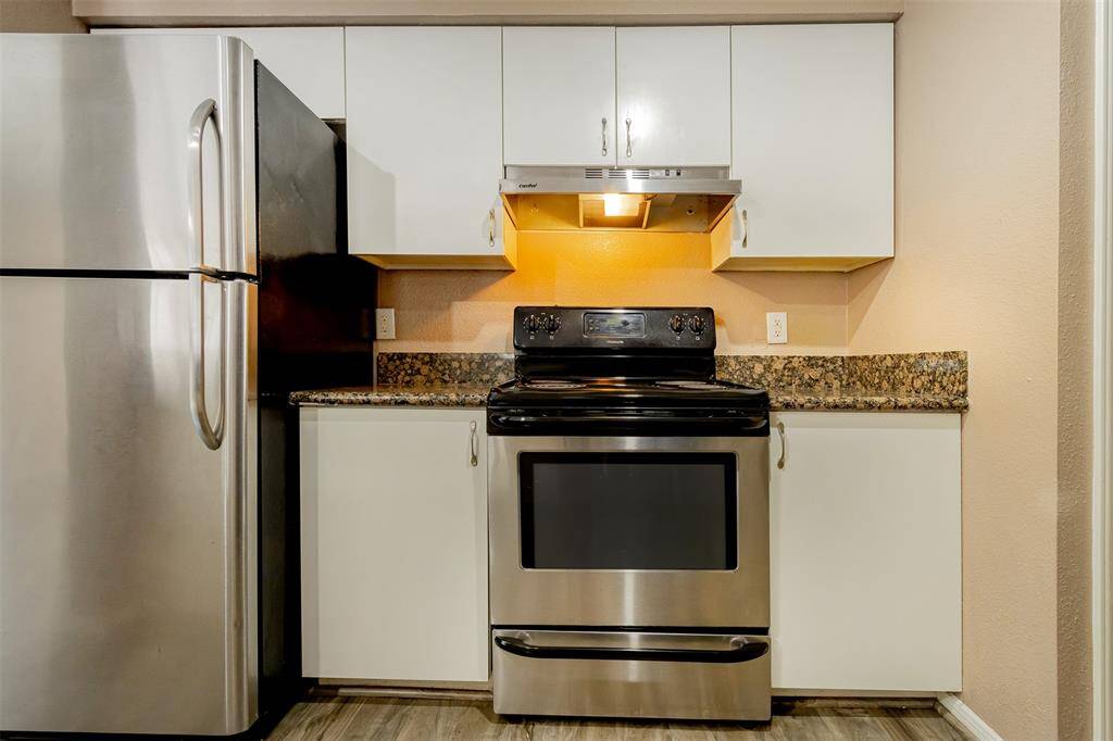 Stainless steal Refrigerator and range! with space to prepare your favorite meals to you, your family and friends!