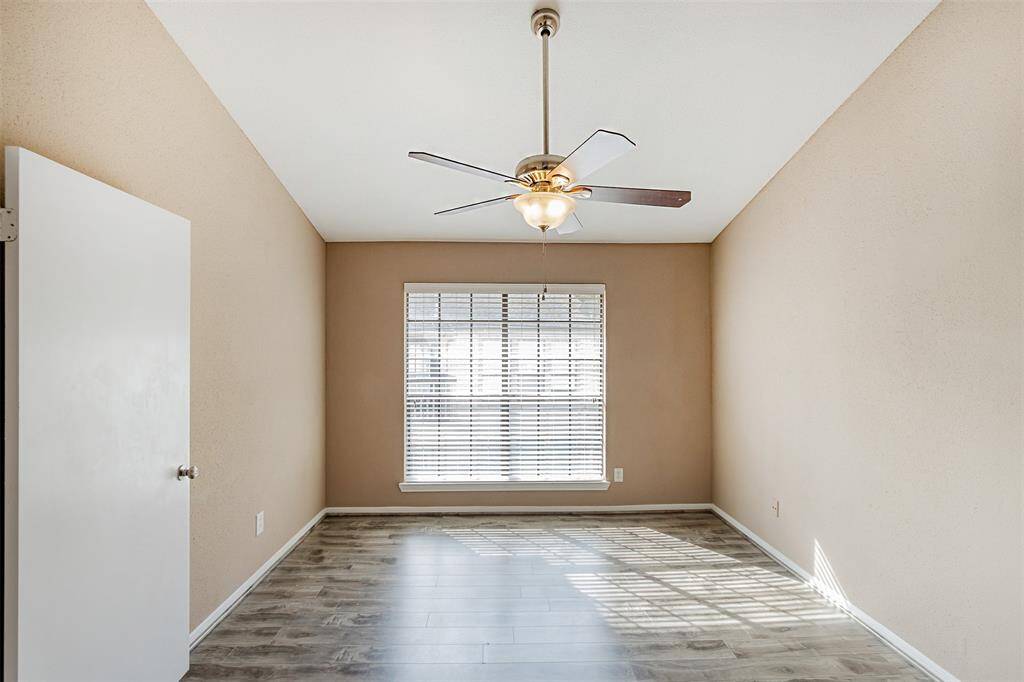 Primary Bedroom with plenty of natural lights and blinds!