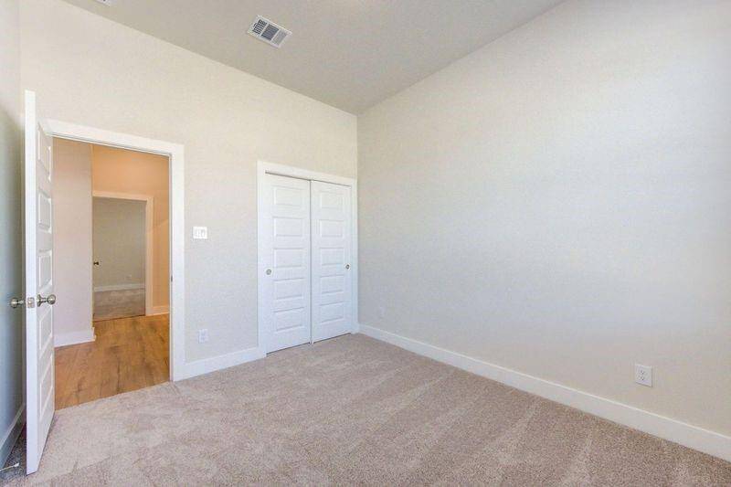 Front secondary bedroom 1.