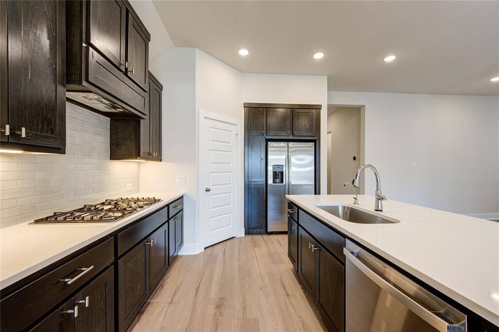 High end finishes and spacious pantry.
