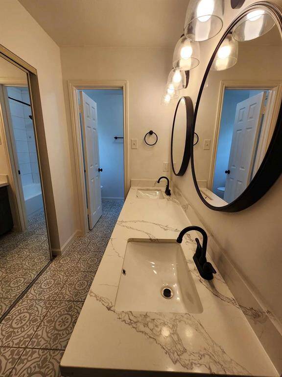 Double sinks w/bronze finished  faucets in Primary bedroom