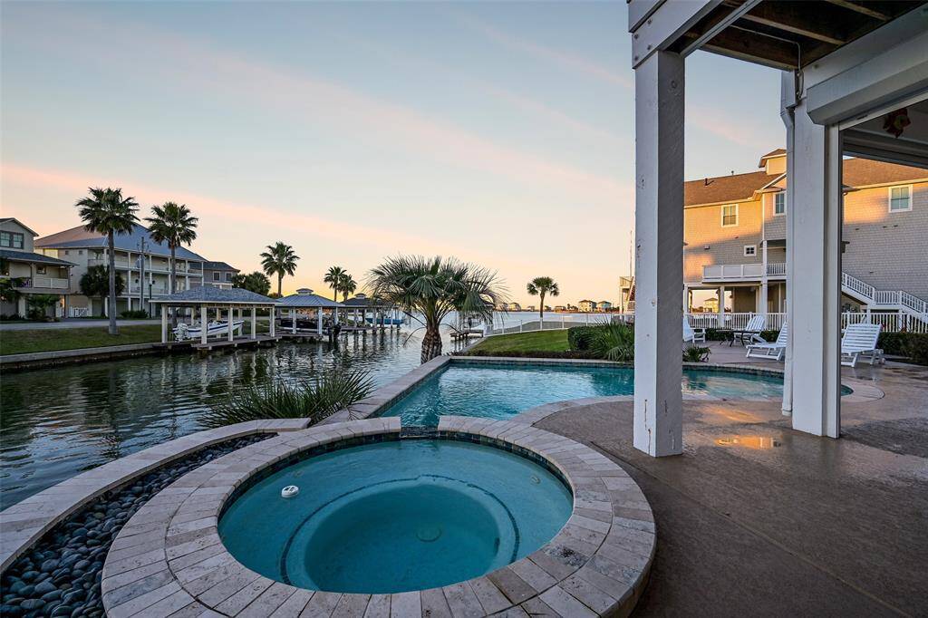 Relax in the hot tub while enjoying the sunsets