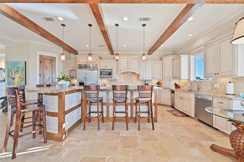 Notice the beautiful beamed ceiling