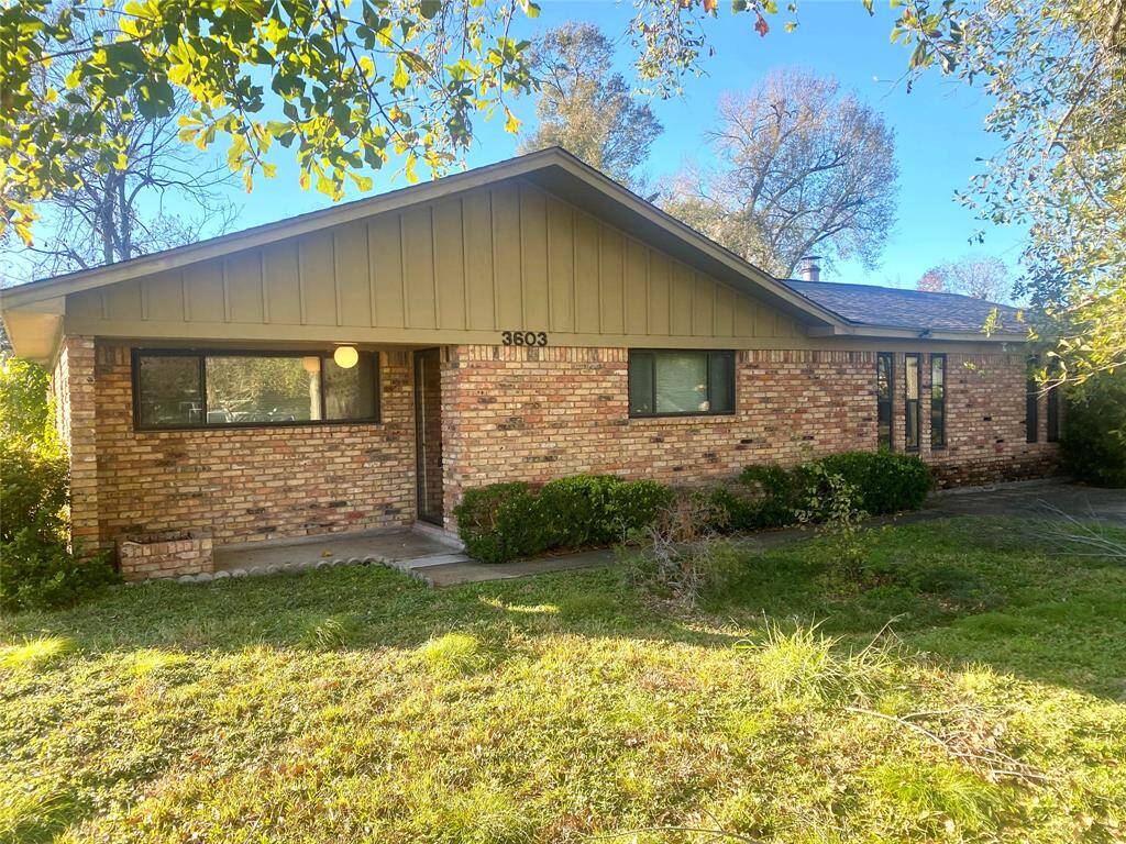 Charming traditional/mid-century modern, full brick property. Original garage modified into a large den with fireplace. Great for entertaining. There is a detached garage converted to office/shop/storage, which could be remodeled into a studio apartment for the in-laws (has utilities ready to go).