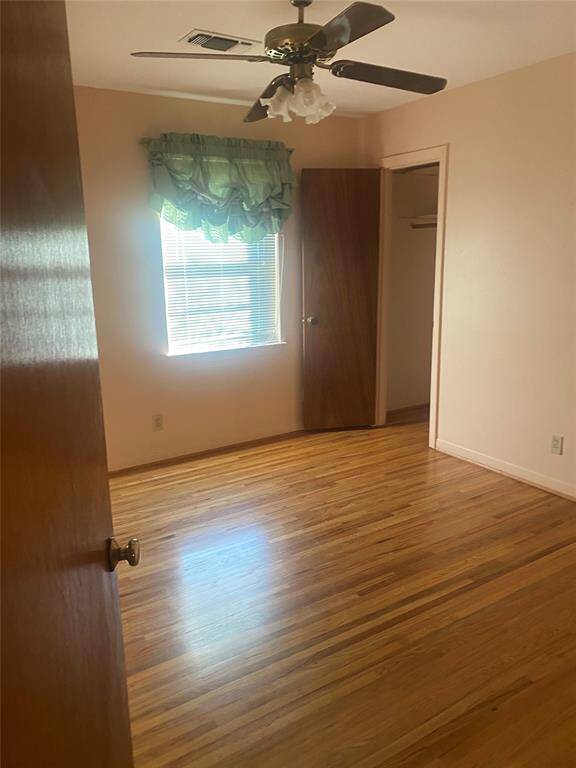 Every bedroom and the living room has the original hard woods.