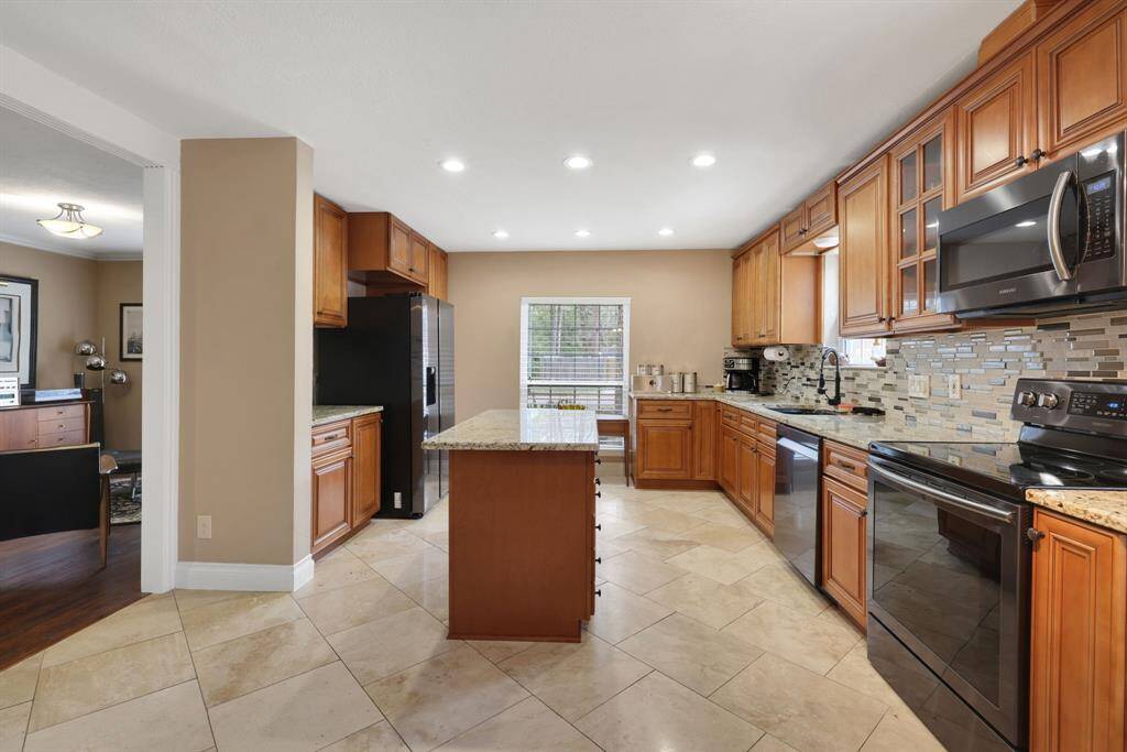 Kitchen is open to the dining/flex room