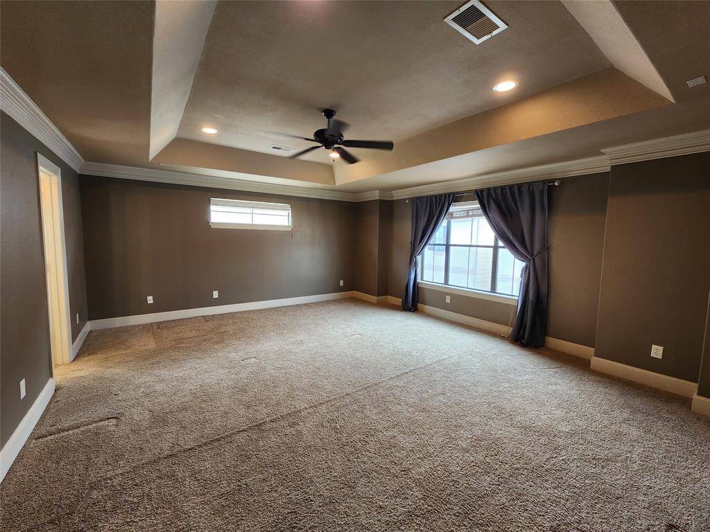 Another view of the primary bedroom located on the 3rd floor.