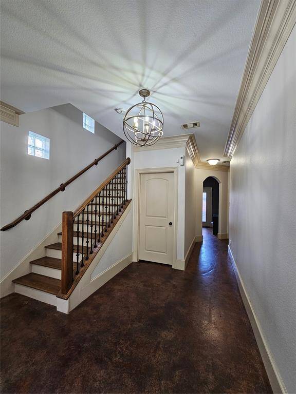 Light filled entry way leading to the downstairs bedroom and flex/office space.
