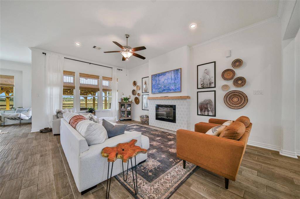 Dining area facing the living room with windows that look into the backyard.