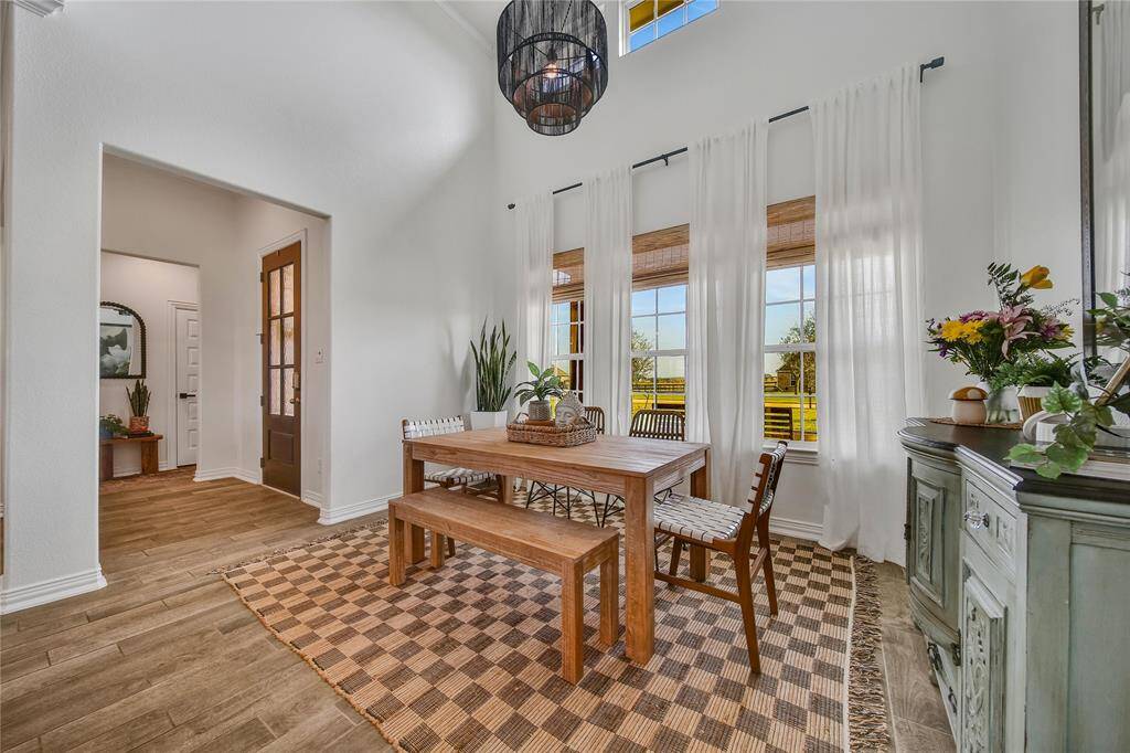 Dining area view and front door from kitchen
