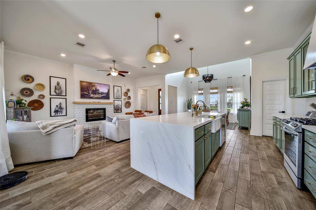 From a sitting room that's overlooking the kitchen and living room.