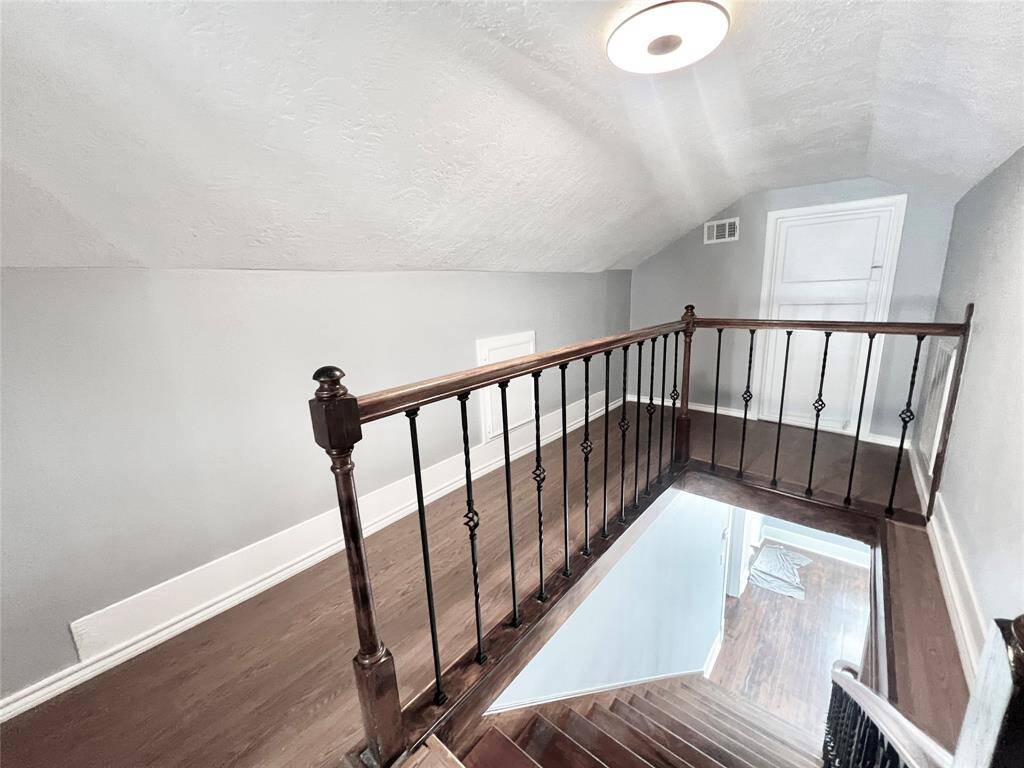 Top of the staircase and storage area