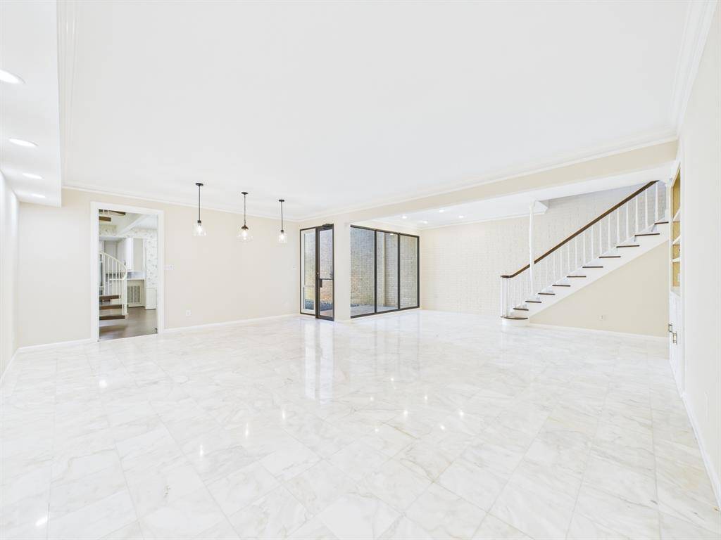 Huge family room (18*17) with marble tile